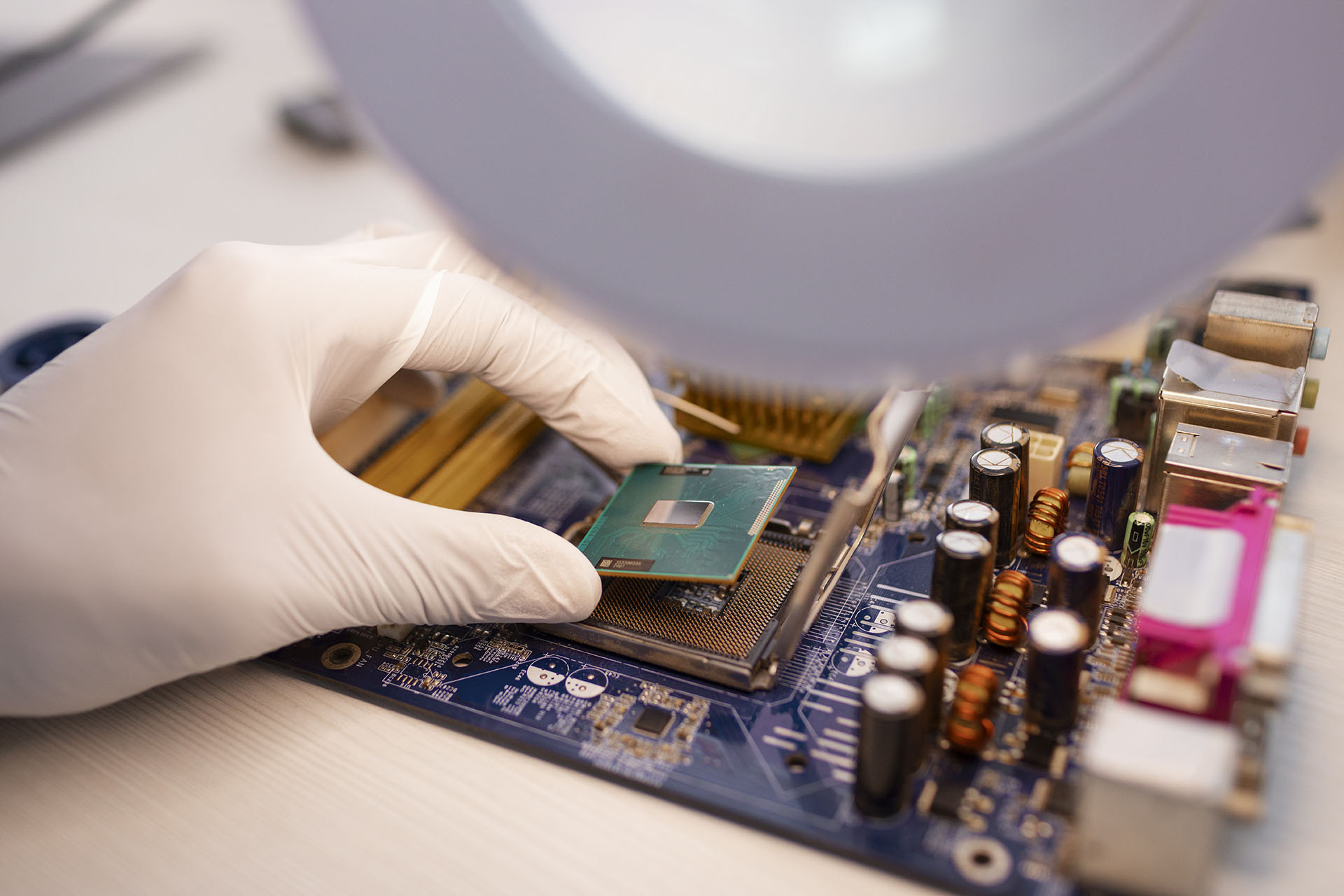 person-repairing-computer-chips